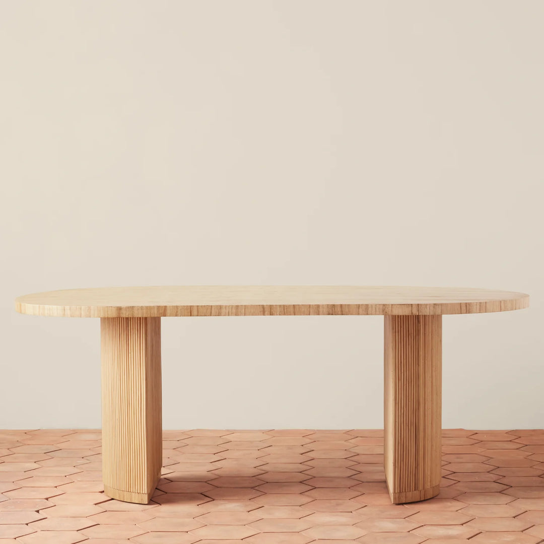 Stacked Rattan Pedestal Oval Dining Table