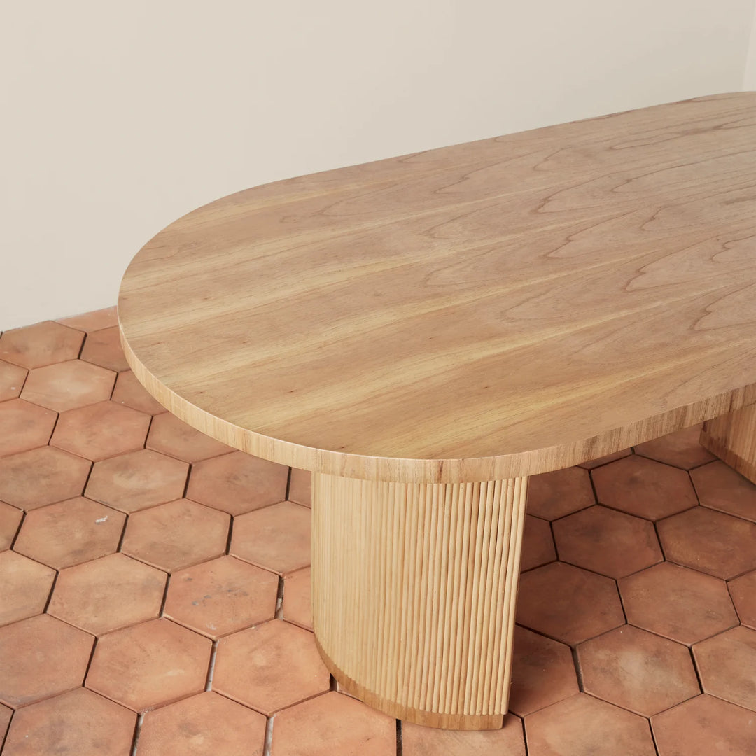Stacked Rattan Pedestal Oval Dining Table