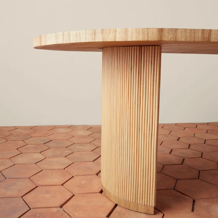 Stacked Rattan Pedestal Oval Dining Table