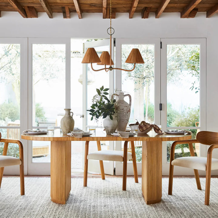 Stacked Rattan Pedestal Oval Dining Table