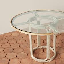 Rattan and Glass Top Dining Table
